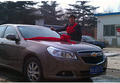 超前涂料獎勵員工轎車，真石漆生產(chǎn)廠家！